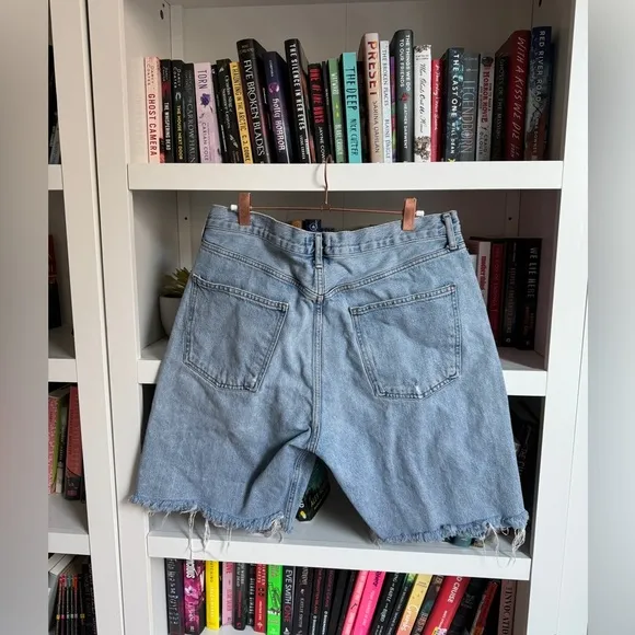 Agolde light wash distressed cut off 90s organic cotton retro denim jean shorts