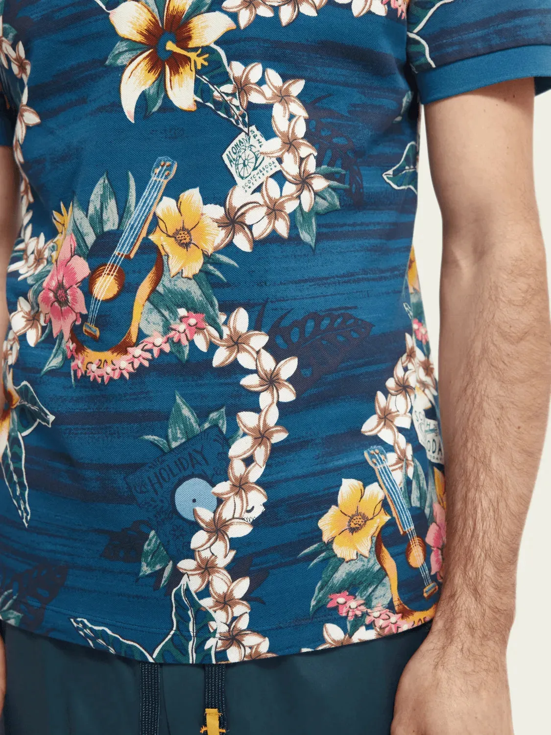 Polo de piqué de algodón orgánico con diseño estampado