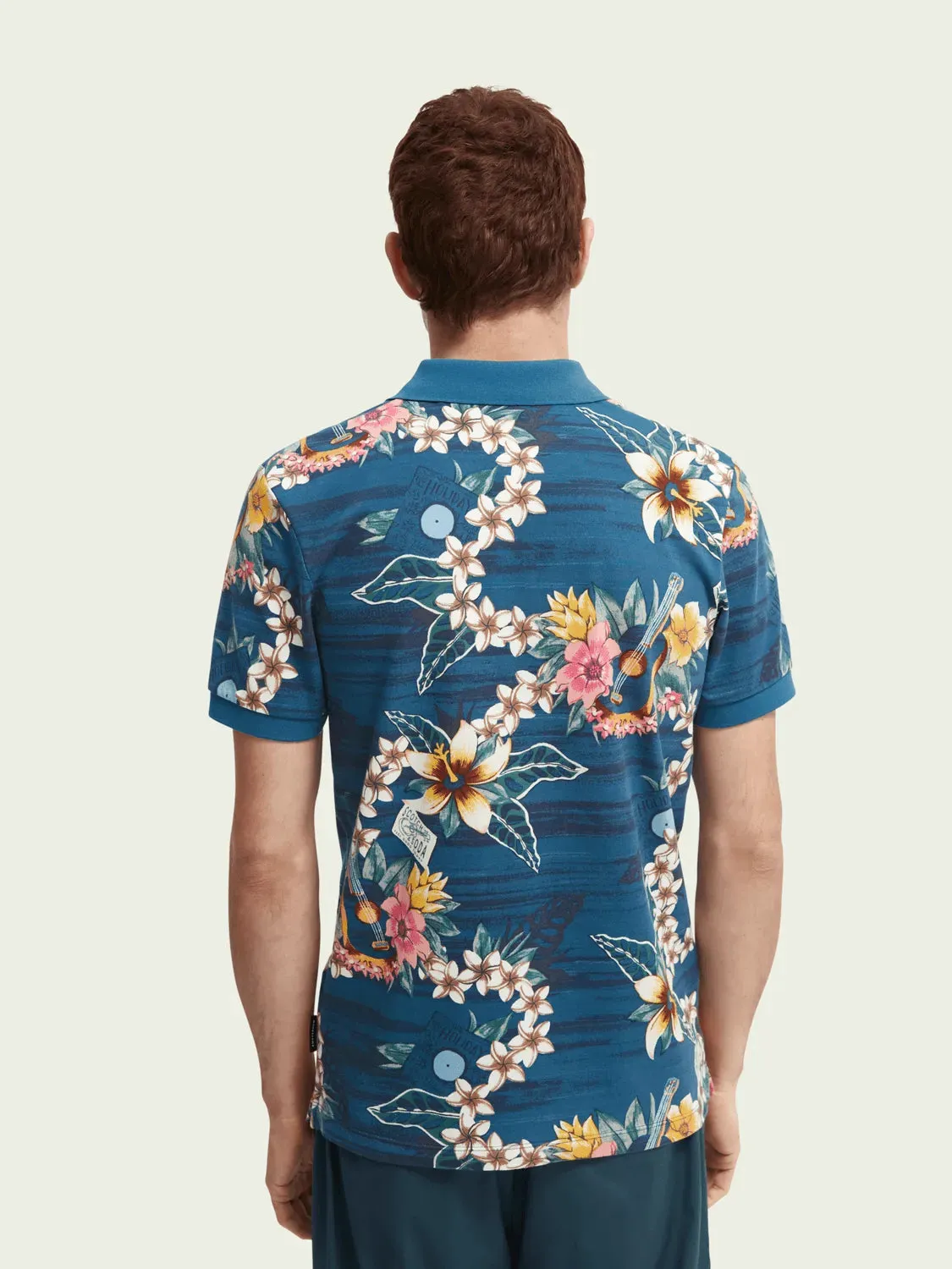 Polo de piqué de algodón orgánico con diseño estampado