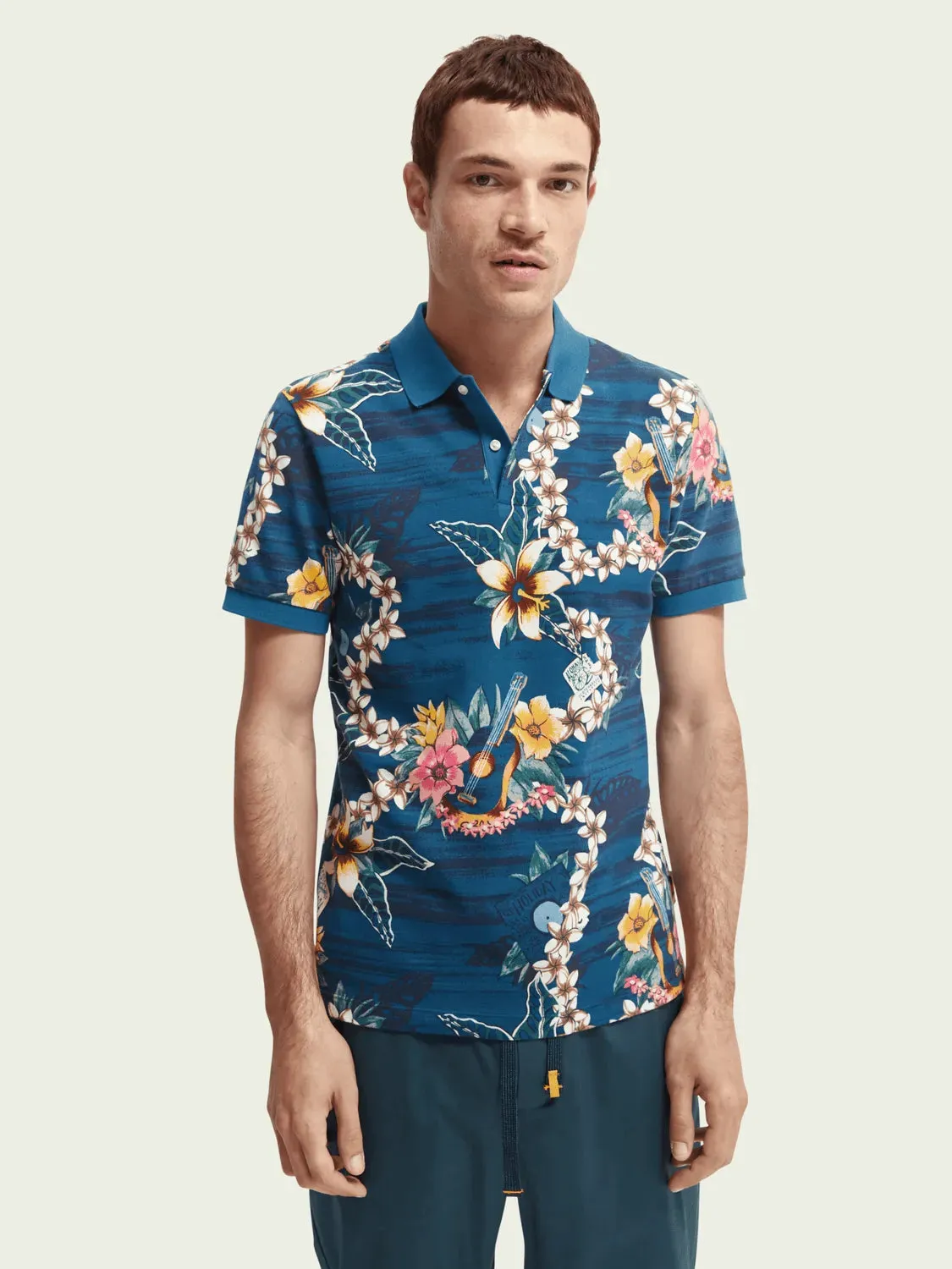 Polo de piqué de algodón orgánico con diseño estampado